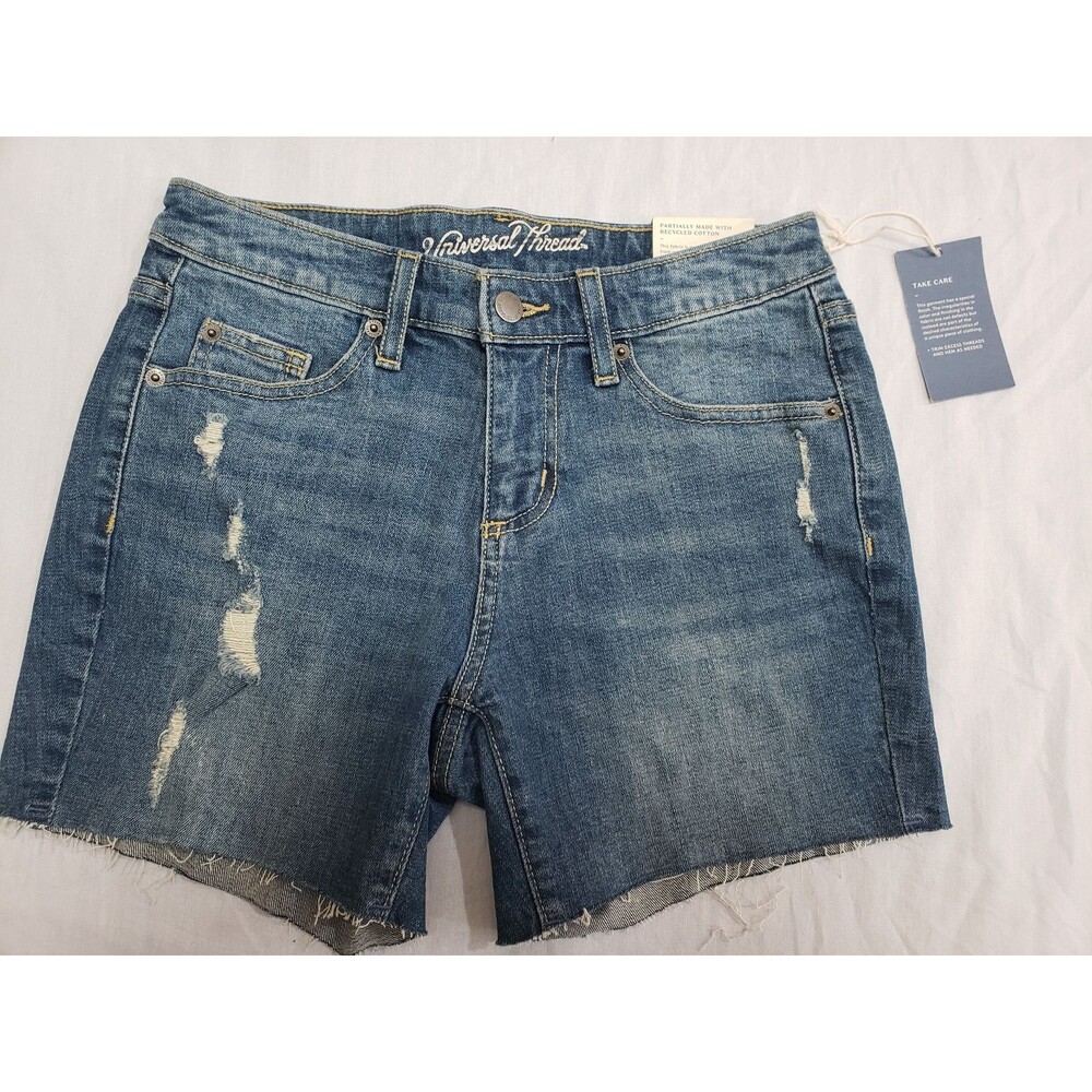 NWT UNIVERSAL THREAD WOMENS MID RISE DISTRESSED CUT OFF JEANS SHORTS SIZE 0
